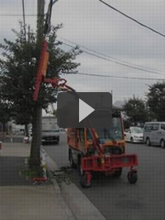 高枝切ハサミを装着した高枝切車